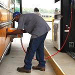 CNG school bus filling